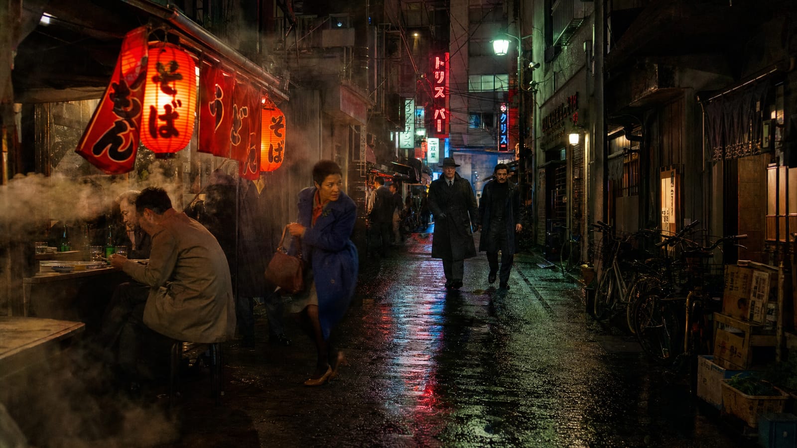 A narrow lantern-lit alley in Tokyo after rain.